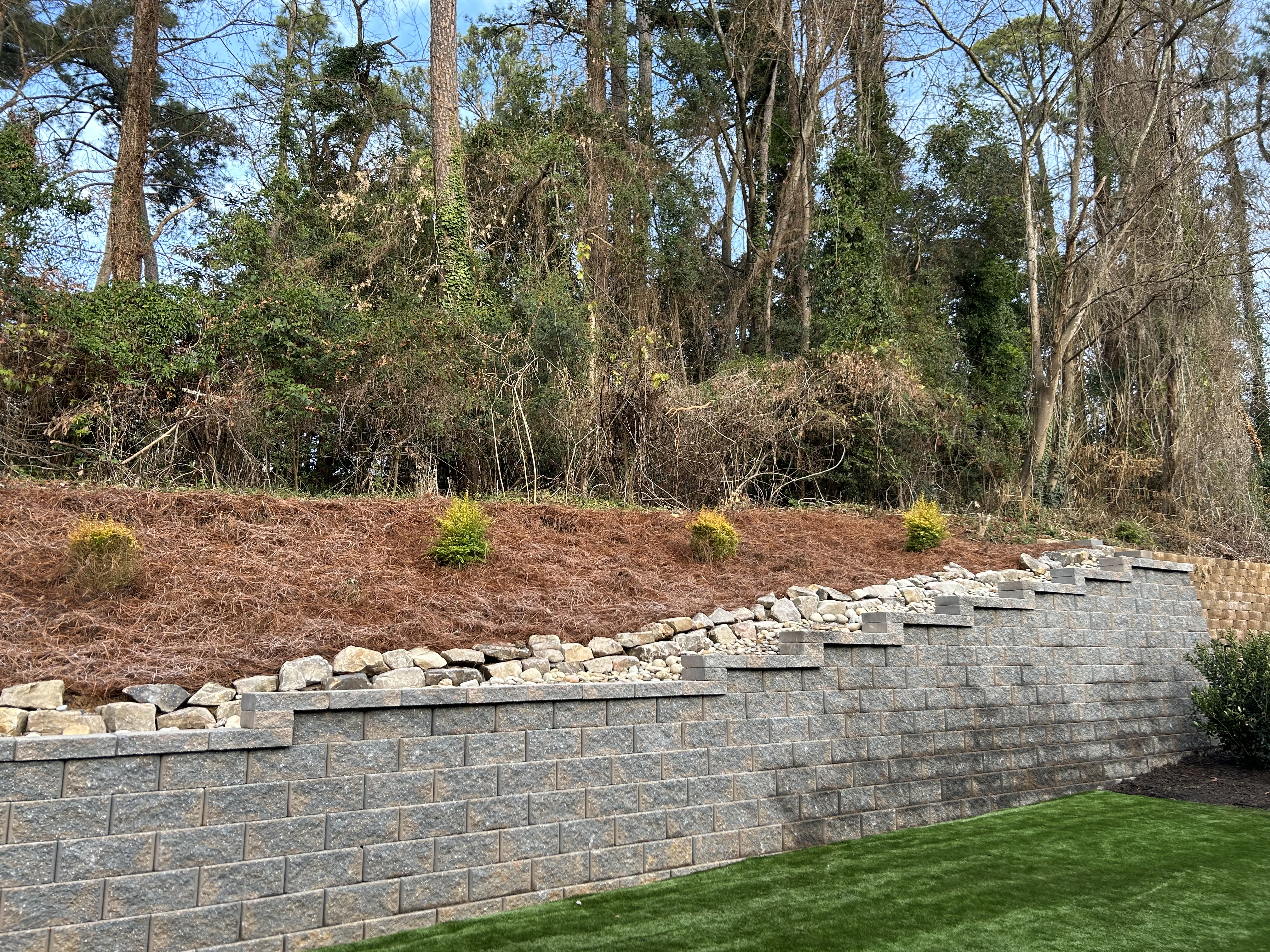 Making Homes More Beautiful®: The Power of Modern Retaining Walls by Mr. Outdoor Living